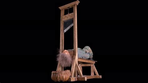 The Guillotine Cuts Off The Head Of The Criminal Previously Such An