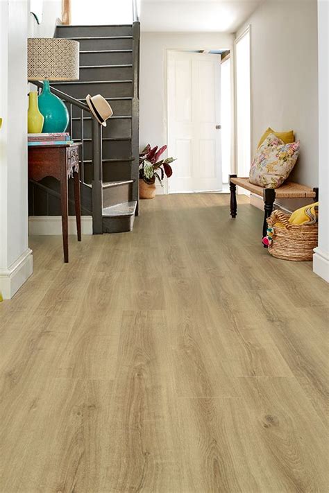 with a natural oak tone and relaxed grain spectra valley oak plank luxury click vinyl flooring