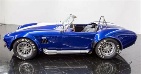 There are two things that cobras do really, really well: 1965 Shelby Cobra 427 S/C MKIII by Superformance 5 Speed ...