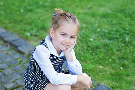 Closeup Face Little Girl Looking At Camera Funny Schoolgirl With