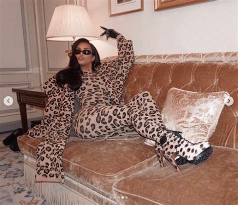 kim kardashian flaunts her enviable curves as she poses in head to toe in leopard ensemble photos