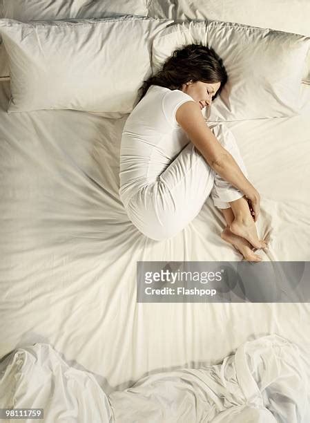 Bent Over Bed Stockfotos En Beelden Getty Images