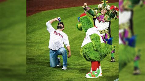 jason kelce for mayor sexy batman hugs the phanatic and chugs a beer at phillies playoff win