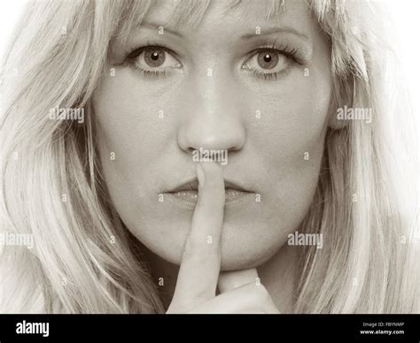 Woman Asking For Silence Finger On Lips Hush Gesture Stock Photo Alamy