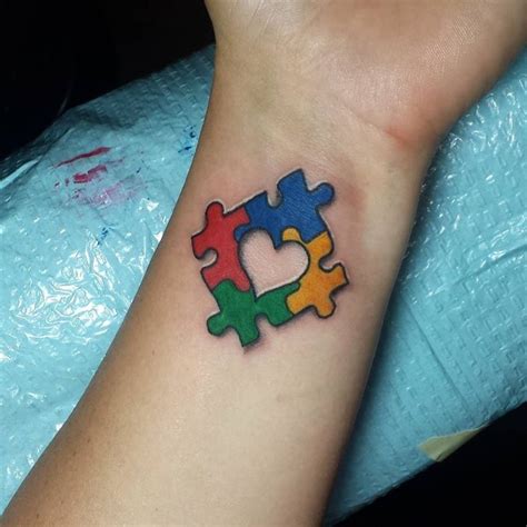 Karen is a gifted artist and designs autism puzzle piece tattoos. Colorful-Puzzle-Piece-Wrist-Tattoo.jpg (730×730) | Autism ...