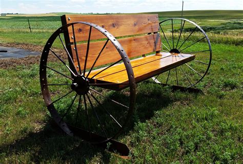 Bench That I Made Using A Pair Of Antique Steel Wheels And Cedar Boards