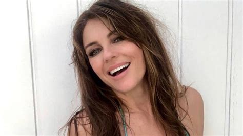 Elizabeth Hurley Wows In Nude Bikini Showcasing Unbelievable Physique As She Dances On The Beach