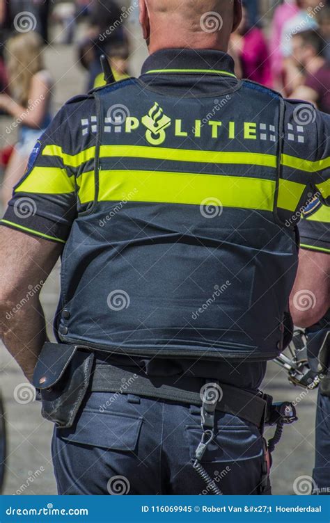 dutch policeman from the back at amsterdam the netherlands editorial image image of holland