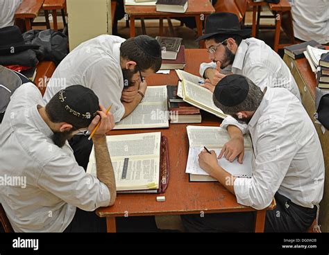 4 Religious Jewish Students Studying Talmud At Lubavitch Headquarters