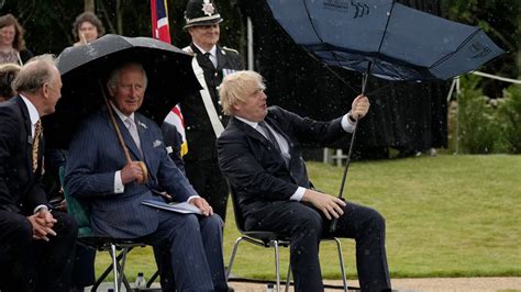 Boris Johnson Struggles With Umbrella At Police Memorial Unveiling The UK Channel