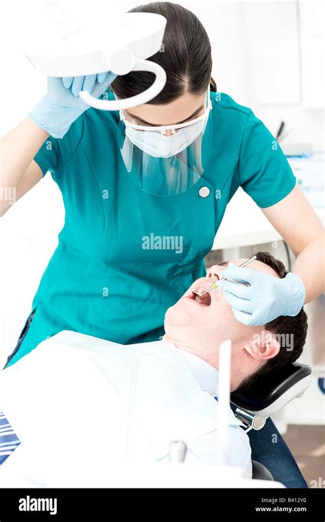 Female Dentist Doing Teeth Checkup Stock Photo Alamy