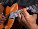 Tips On Playing Acoustic Guitar Pictures