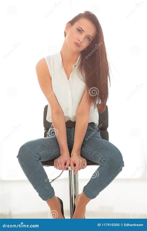 Beautiful Young Woman Sitting In A Chair Stock Image Image Of