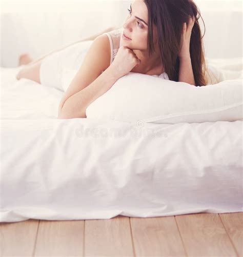 Pretty Woman Lying Down On Her Bed At Home Stock Image Image Of Lying