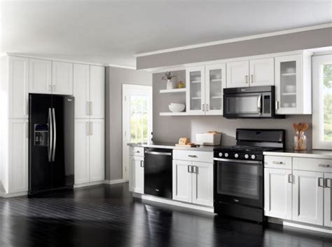 Black and white kitchen design. Decorating around black appliances