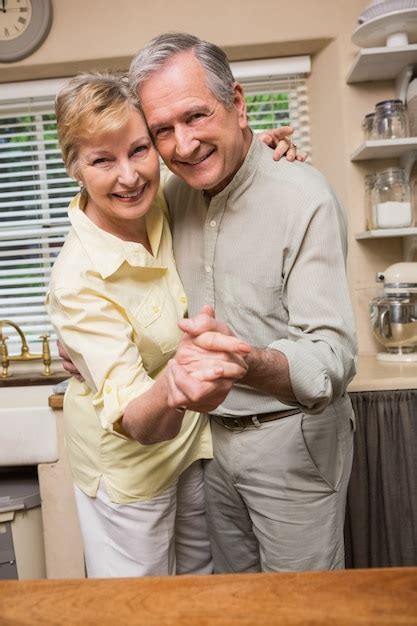 premium photo romantic senior couple dancing together