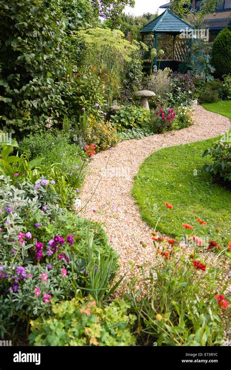 English Cottage Garden Winding Shingle Path Leading To A Gazebo