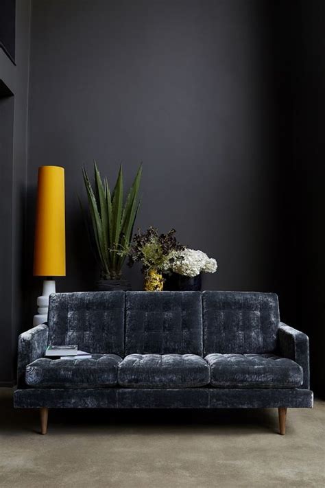 This dark blue works well with yellow and white. Ten Rooms that Rock Dark Walls | Rose And Grey