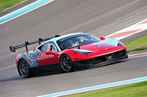 Find yellow in the scuderia ferrari shields,. A Ferrari 458 GT can now be driven in Abu Dhabi - Arabianbusiness