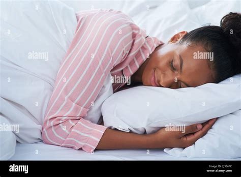 Sleeping Just Like A Baby Shot Of An Attractive Young Woman Peacefully