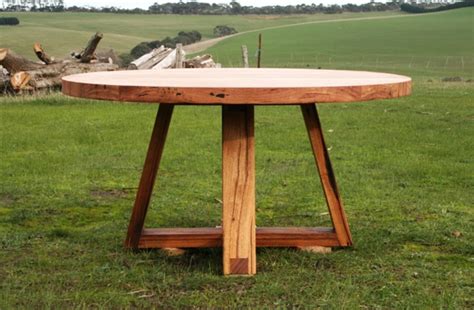 Whether you're hosting an extravagant dinner party or just having a quiet family dinner, the perfect dining table will add to the ambience and tie the room together. Recycled timber round dining table