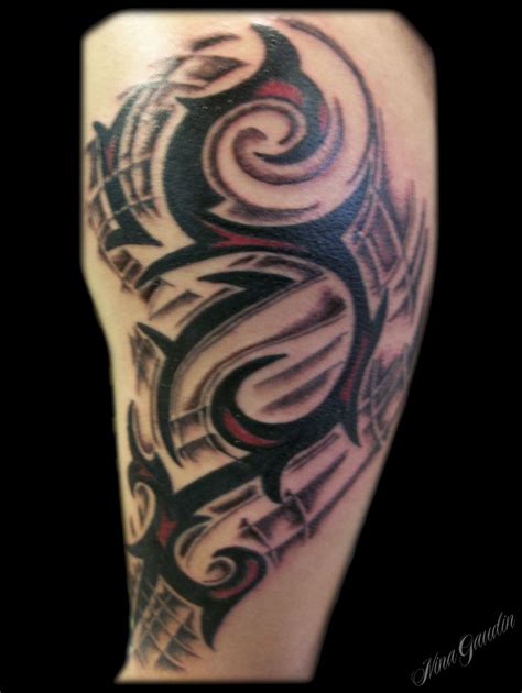 This is a great example of some very real looking human tattooing, with excellent shading done throughout. Black and red tribal swirl with shading bicep - Tattoo by ...