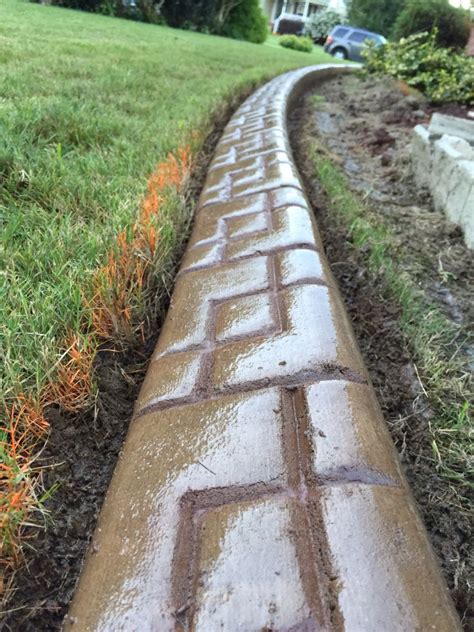 How to build concrete lawn edging. Chesapeake Custom Curbs, LLC Decorative concrete curbing ...