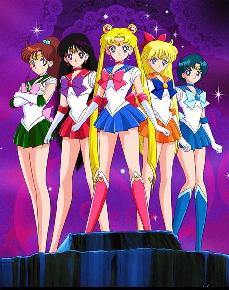 The Sailor Girls Are Standing On Top Of A Hill With Their Arms Around