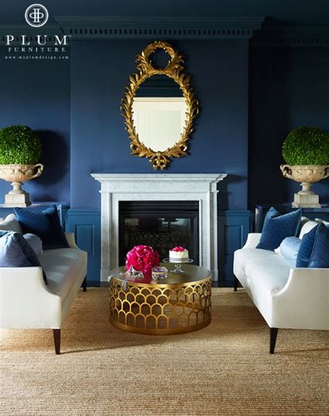 Maybe you would like to learn more about one of these? Love the cocktail table & the navy/gold combo. #navy walls ...