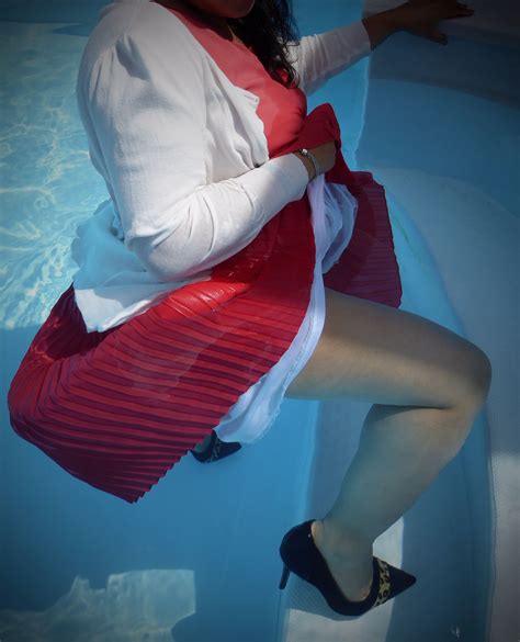 beautiful red pleated dress and heels in the pool wet dress sexy poses wet clothes