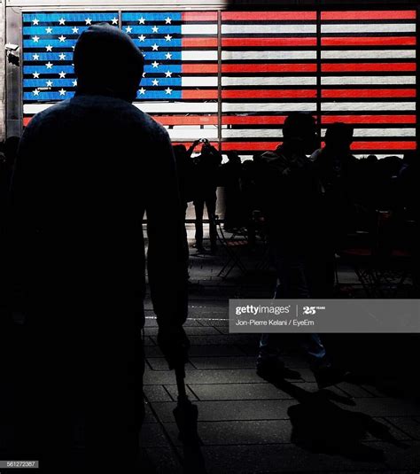 Silhouette Of People Standing In Front Of American Flag Silhouette People American Flag