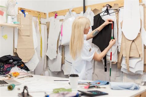 Fashion Designer Woman Working On Her Designs In The Studio Creative