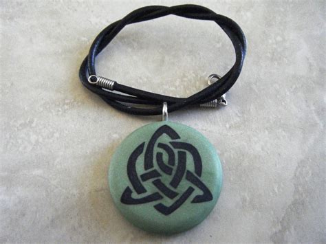 Celtic Symbol For Sisterhood Hand Carved On A Green Pearl