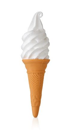 Vanilla Soft Serve Ice Cream Or Frozen Yogurt In A Wafer Cone Isolated On A White Background