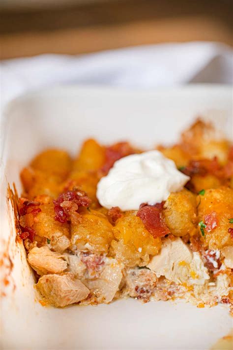 Sprinkle final layer of tater tots with cheese and bacon. Chicken Bacon Ranch Tater Tot Casserole Recipe - Dinner ...