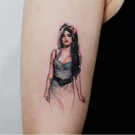 The tattoo was later used as the logo for the amy winehouse foundation, which was founded after her untimely death in 2011. Amy Winehouse tattoo on the right bicep. Tattoo Artist ...