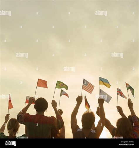 Group Of People Waving Country Flags Stock Photo Alamy