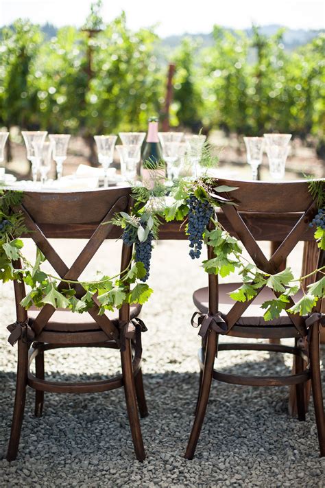 To add even more to your wedding, don't miss our guide to styling your wedding aisle. vineyard wedding chair decor | Photo by Megan Clouse ...