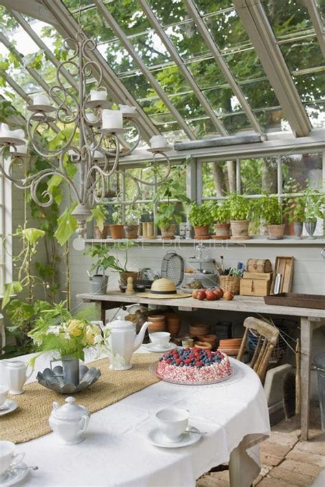Somerset has greenhouses available for outdoor dining, and lots of heaters on their patio. greenhouse-dining-room-for-winter-season | HomeMydesign