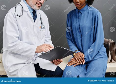 Doctor Asking Question To Patient Before Treatment Stock Photo Image