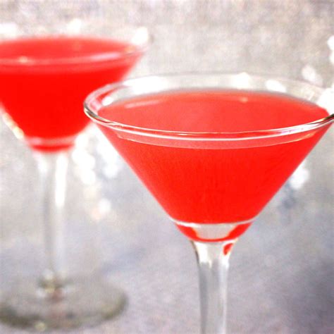 the pomegranate martini uses gin pomegranate juice and citrus mixers to make a delicious drink