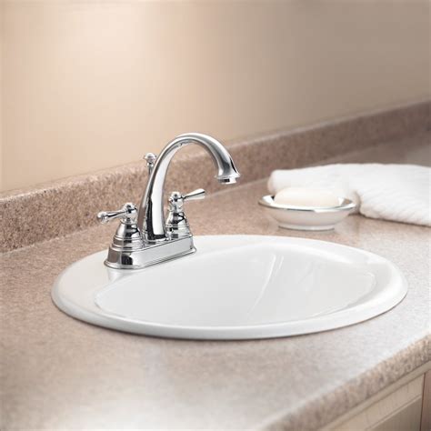 Detailed designs are conspicuous from the escutcheon and lever handle. Moen 6121P Kingsley Two-Handle High Arc Bathroom Faucet ...
