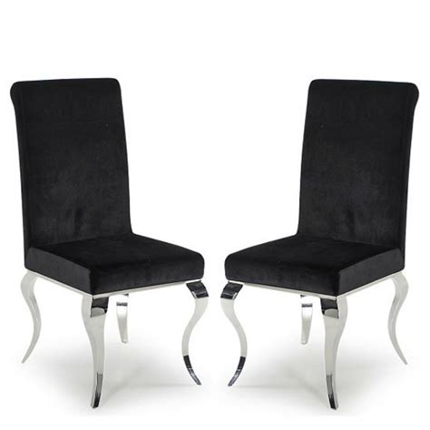 These luxury dining chairs will keep family and guests sitting in comfort while they eat. Louis pair of Luxury Velvet Chrome Leg Black Dining ...