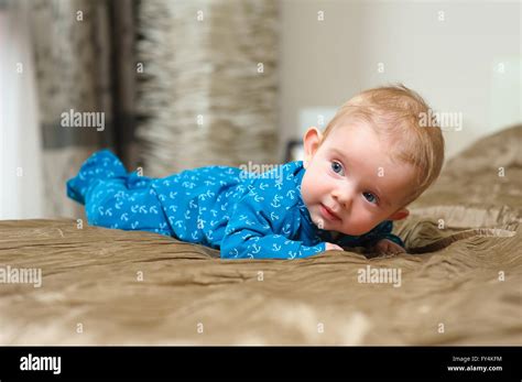 Baby Boy Lying On Belly Stock Photo Alamy