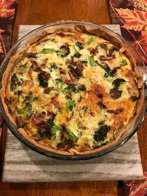 Put ham pieces, mushrooms and broccoli in bottom of prepared pie crust. Homemade Quiche with mushrooms, onions, broccoli, bacon ...