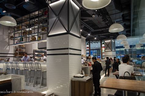 Jeenah moon/bloomberg via getty images. DEAN & DELUCA - gourmet cafe at EmQuartier in Bangkok ...