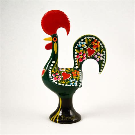 A variety of apple with crisp fruit that has yellow skin streaked with red. Figurado Metal CG galo barcelos (1)