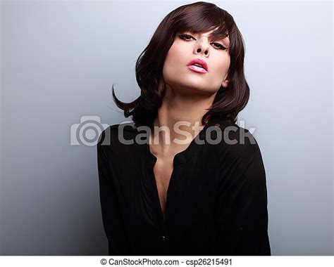 Sexy Short Hair Style Woman Posing In Black Shirt On Blue Background Canstock