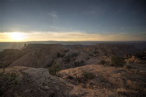Crepuscular Rays At Sunset Near Upheaval Dome Island In The Sky