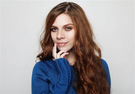 Pretty Beautiful Woman With Curly Hair Looking At Camera Having Excited